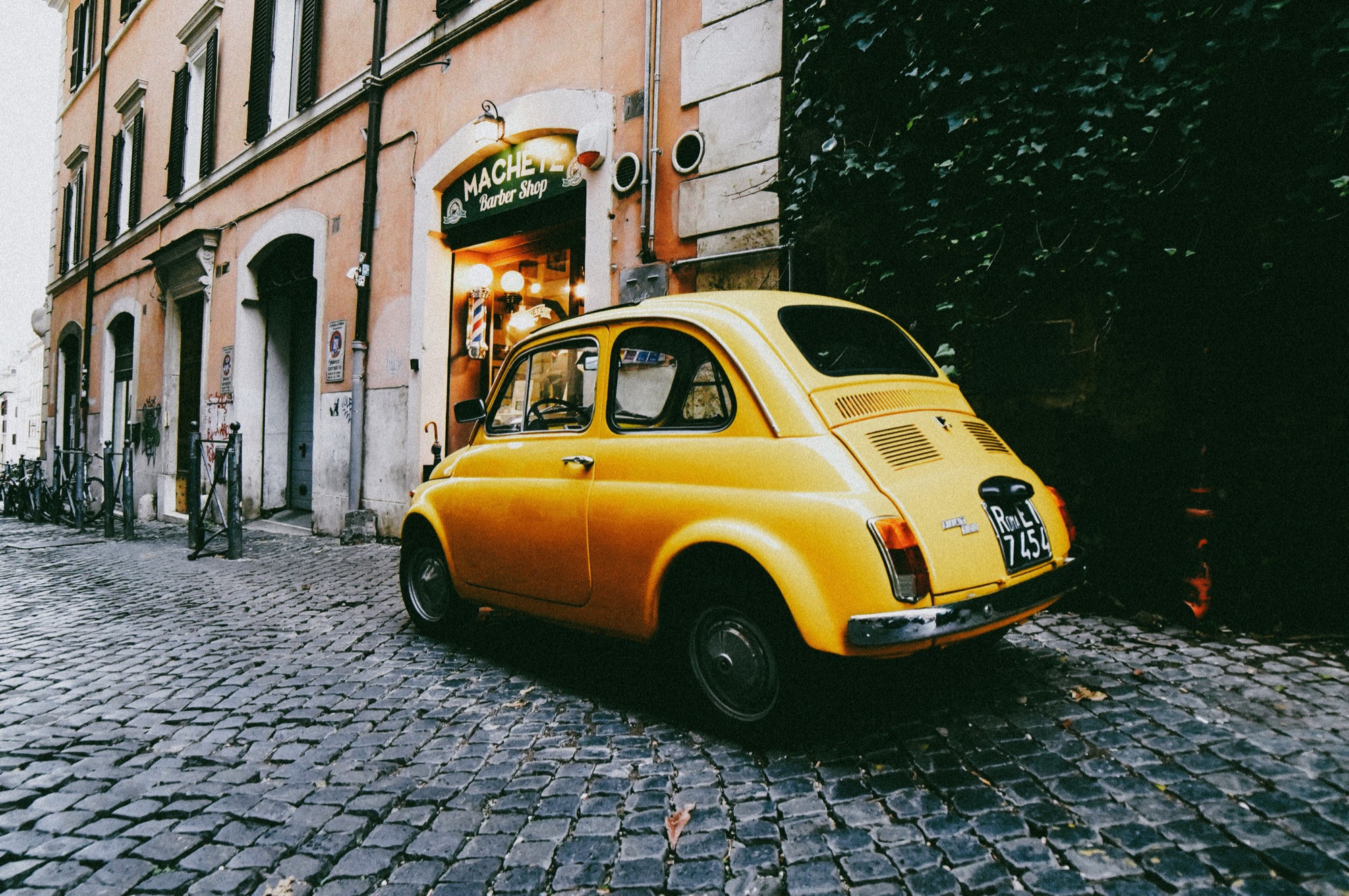 A vintage Fiat 500 on an Italian street